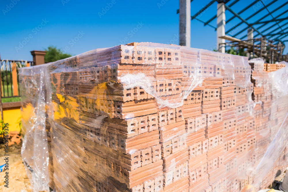 Pile of bricks for construction , group of bricks square construction materials