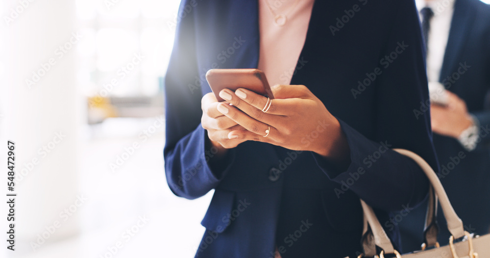 Business woman, phone and hands texting in communication, social media or chatting at the office. Hand of female employee reading, typing or browsing on mobile smartphone at the workplace