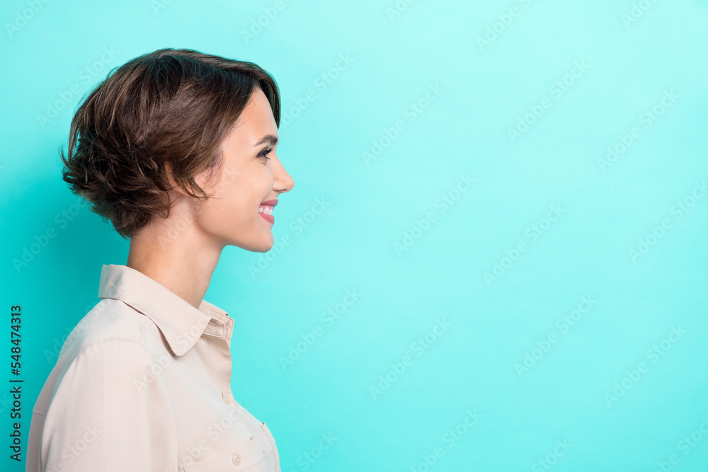 Profile photo of young adorable cute woman wear formal shirt toothy smile enjoy looking empty space offer vacancy isolated on aquamarine color background Profile photo of young adorable cute woman wear formal shirt toothy smile enjoy looking empty space offer vacancy isolated on aquamarine color background