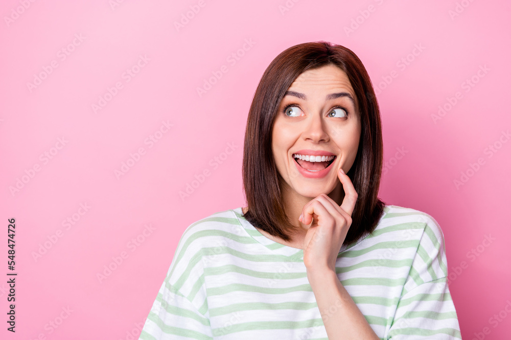 Closeup photo of young attractive girl touch cheeks positive dreamy look empty space isolated on pink color background Closeup photo of young attractive girl touch cheeks positive dreamy look empty space isolated on pink color background