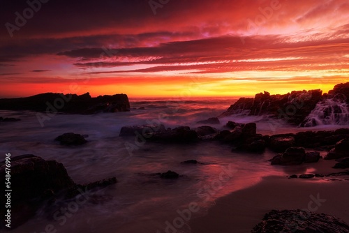 Magnifient red sunrise over the coast of Merimbula