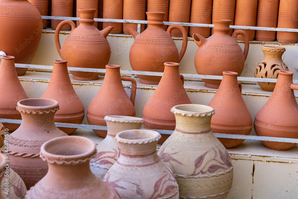 Oman Hand Made Pottery in Nizwa Market. Clay Jars at the Rural Traditional Arabic Bazaar, Oman. 
