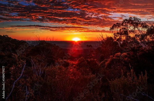 Glorious sunrise views to horizon across mountain ranges © Diaconescu