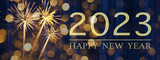 HAPPY NEW YEAR 2023 celebration holiday firework background greeting card banner - Golden fireworks on blue wooden wall texture