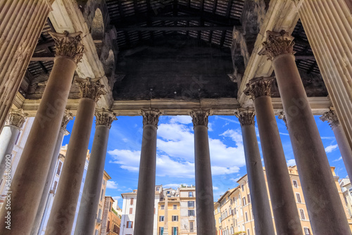 Fototapeta The Pantheon in Rome, Italy: view from inside the pronaos through the colonnaded portico