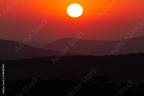 Amazing sunset over the mountains and hills in Lesvos island, northern Aegean sea, Greece, Europe 