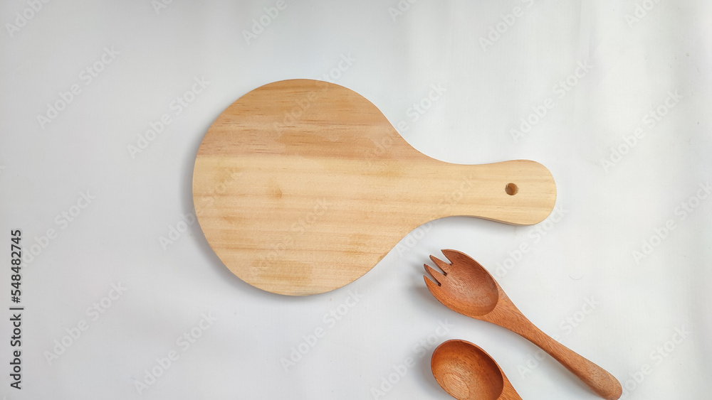 Pizza board and cutlery wooden plate isolated on white background Pizza board and cutlery wooden plate isolated on white background