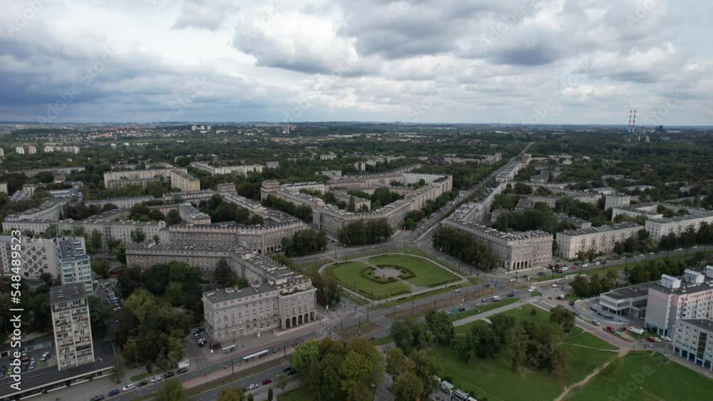 Plac Centralny Nowa Huta, Kraków, Poland, Europe, aerial 4k video panorama. Ronald Reagan Central Square in Nowa Huta (bird's eye view). Modernism cityscape Plac Centralny Nowa Huta, Kraków, Poland, Europe, aerial 4k video panorama. Ronald Reagan Central Square in Nowa Huta (bird's eye view). Modernism cityscape