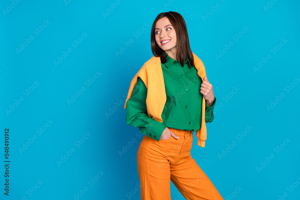 Photo of cute nice lady look empty space low price clothes boutique wear cool outfit sweater shoulders isolated on blue color background