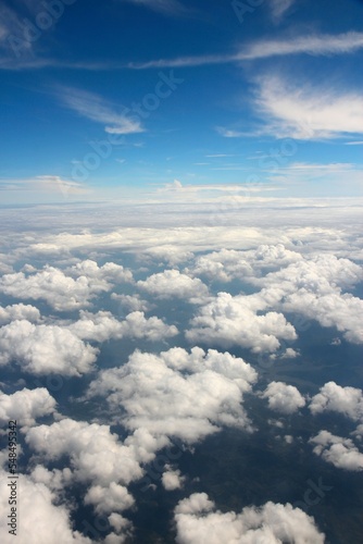 Passenger aircraft view over clouds