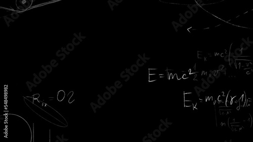 Formulas of the general theory of relativity and the equation of equivalence of mass and energy. Numbers on a black background photo