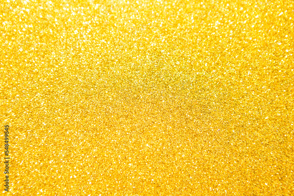 Abstract blurred gold glitter background, shiny golden texture background, Christmas and New year background Abstract blurred gold glitter background, shiny golden texture background, Christmas and New year background