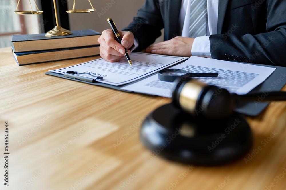 Attorney reading law code, studying constitution to protect human rights closeup, Male lawyer or judge working with Law books, gavel... Attorney reading law code, studying constitution to protect human rights closeup, Male lawyer or judge working with Law books, gavel...
