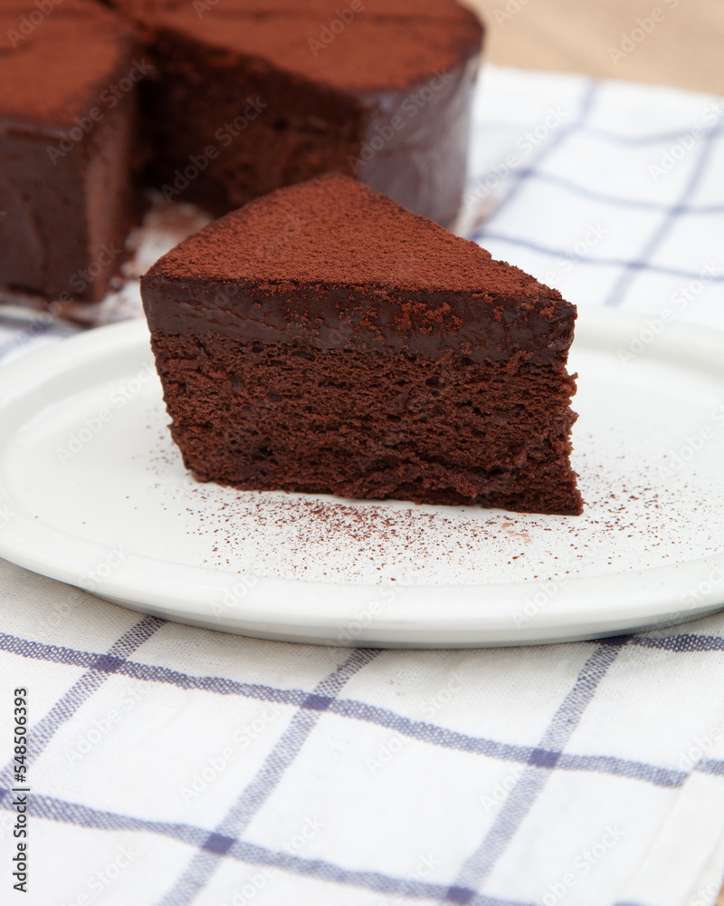 A slice of classic soft and rich chocolate cake A slice of classic soft and rich chocolate cake