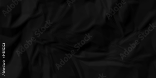 Dark Black facbric paper crumpled texture. dark black textured crumpled black paper background. panorama black paper texture background, crumpled pattern 