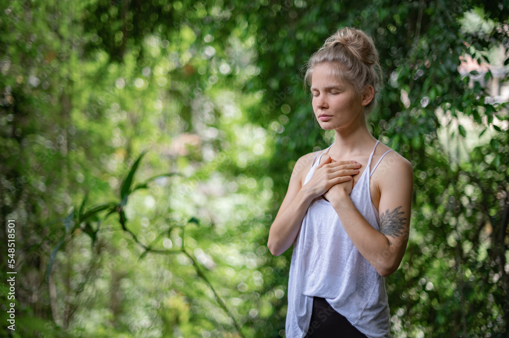 Girl practice yoga meditation outdoor in park Girl practice yoga meditation outdoor in park