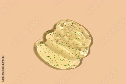 Liquid gel cosmetic smudge beige background
