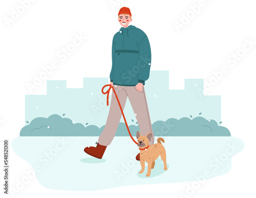Young man walking with dog. Pet owner strolling with his dog on leash. Walk Your Dog Month concept.