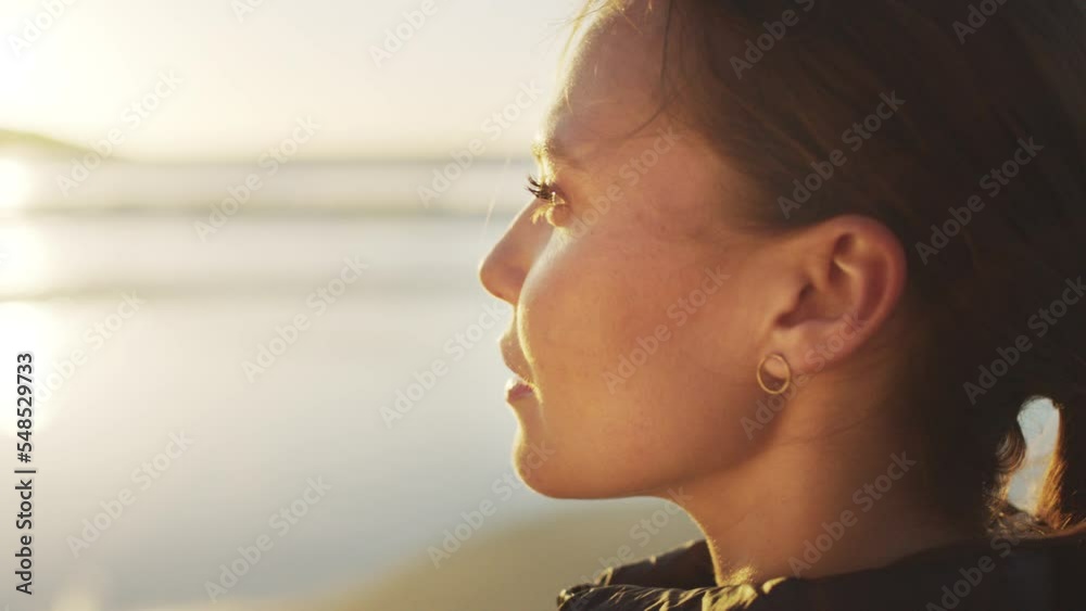 Beach, thinking and calm woman with fitness, wellness and outdoor healing for peace, inspiration and healthy lifestyle on sunset horizon. Ocean waves, focus and self care girl on holiday in nature