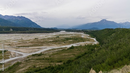 Scenic shot of Matanuska River and Chugach Mountain in Palmer, Alaska photo