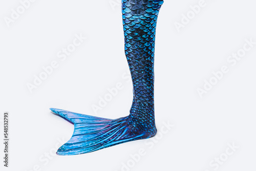 Blue tail of mermaid with scales photo