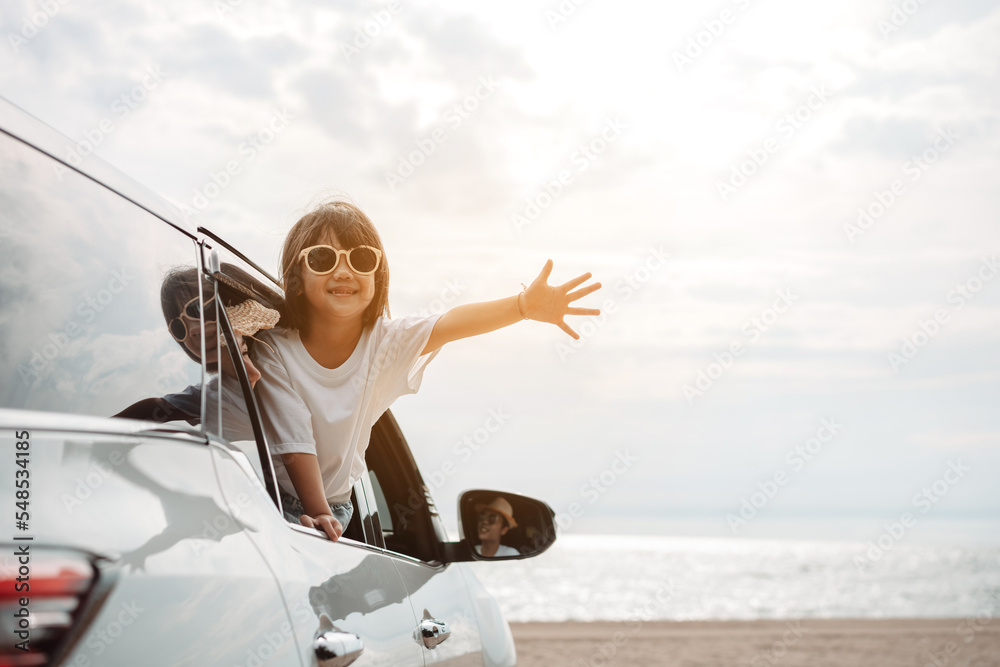 Hatchback Car travel driving road trip of family summer vacation in car at sunset,Girls happy traveling enjoy holidays and relaxation together get the atmosphere and go to destination