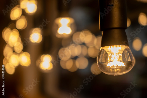 Close up view of shiny lights with dark background and bokeh effect