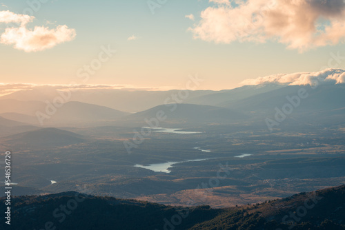 Tranquil mountain range valley in twilight