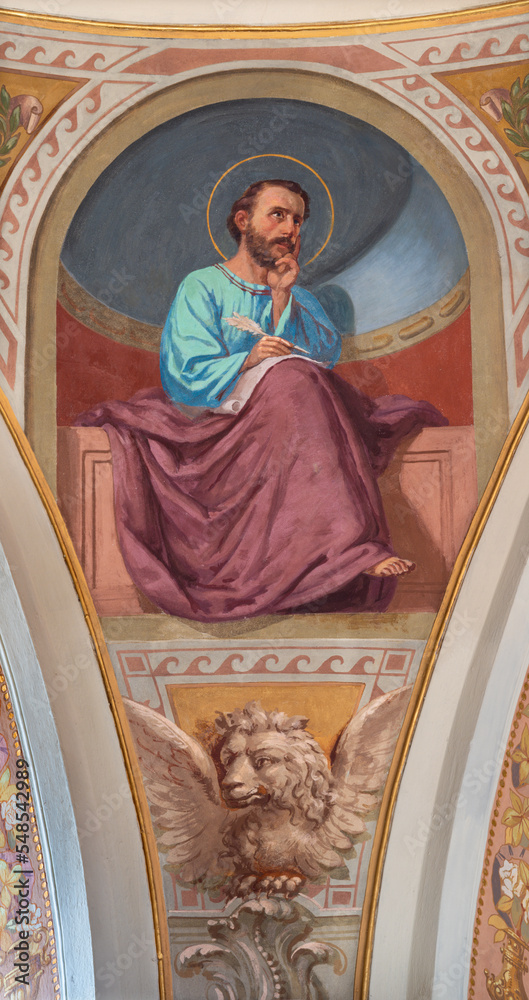 IVREA, ITALY - JULY 15, 2022: The fresco of St. Mark the Evangelist in cupola of church Chiesa di San Salvatore by Giovanni Silvestro (1914).