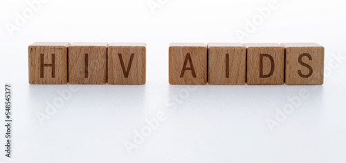 Wood blocks spelling AIDS HIV on white background