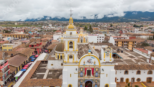 Chignahuapan, Puebla Mexico. Nov 23 2022. Panoramic view of the indigenous Baroque church Parroquia de Santiago Apóstol in the central Plaza de Armas. photo