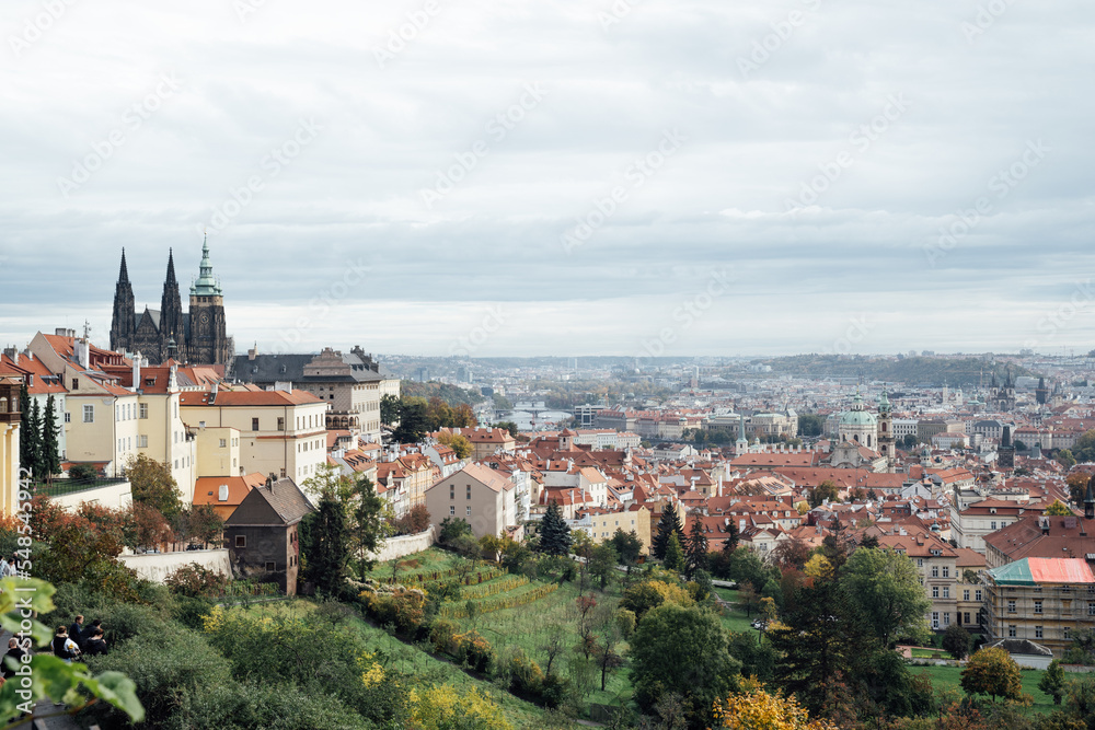 View of Prague Castle from the hill and the orange roof in harmony with nature