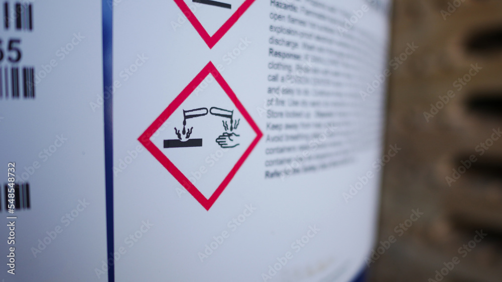 Flammable, acid, volatile, warning labels, mounted on hazardous ...