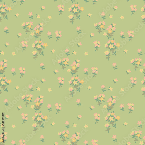 Seamless pattern with small blooming flowers on a soft green background.