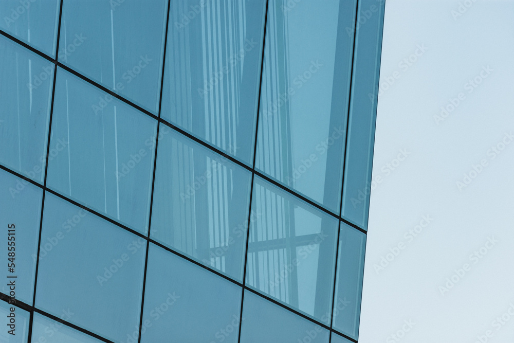 Close up to a window grid wall of a business building Close up to a window grid wall of a business building