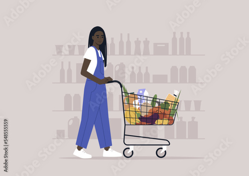 A young female African character in denim overalls pushing a grocery cart in a supermarket