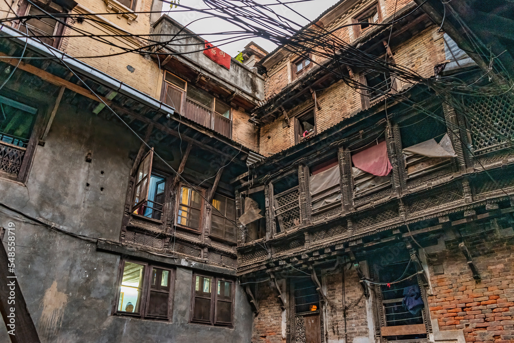 Tourist postcard of Kathmandu and its busy downtown streets.