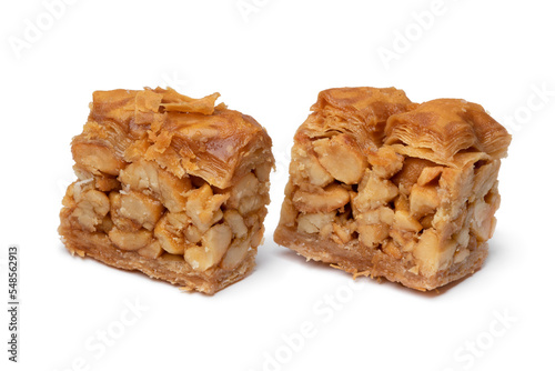 Pair of traditional Syrian cookies stuffed with nuts isolated on white background