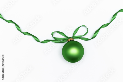 Elegant Christmas flatlay mockup composition with green ball on the ribbon