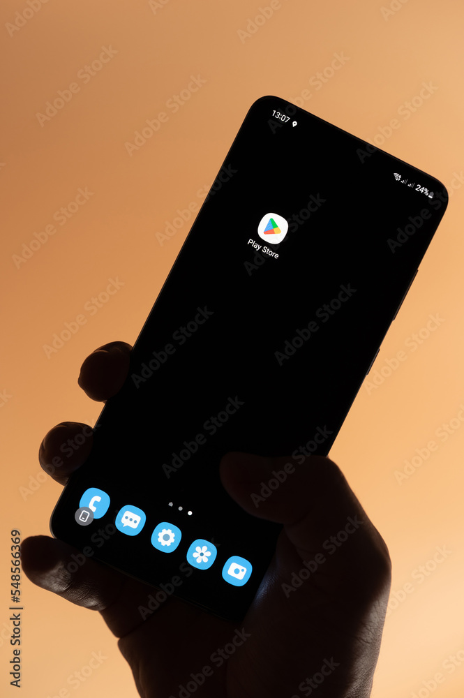 Open google play store app on smartphone Stock Photo | Adobe Stock