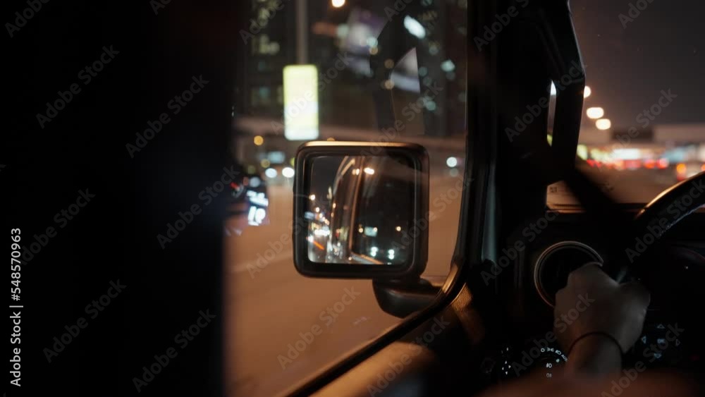 View Of The Drivers Window And Side Mirror While Travelling On Highway At Night View Of The Drivers Window And Side Mirror While Travelling On Highway At Night