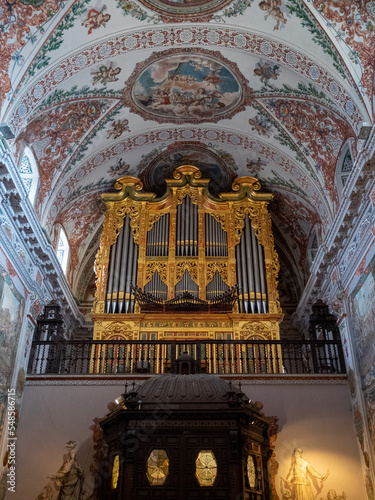 Hospital de los Venerables church barrel vault ceiling frescoes by Lucas de Valdes and choir organ