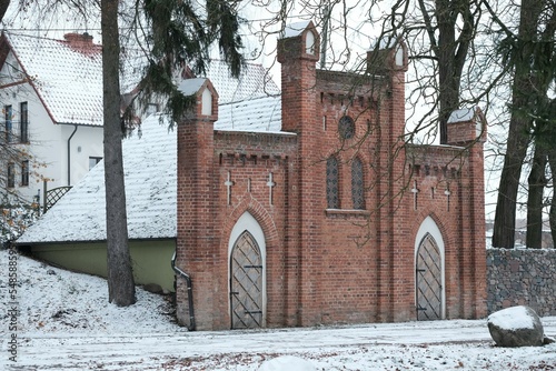 Historic red brick chapel in Dymnik, Warmia, Poland photo