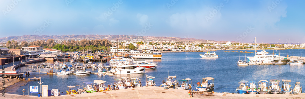 Paphos, Cyprus - September 08, 2022 : Panoramic view of Paphos harbour with boats and ships in Paphos, Cyprus