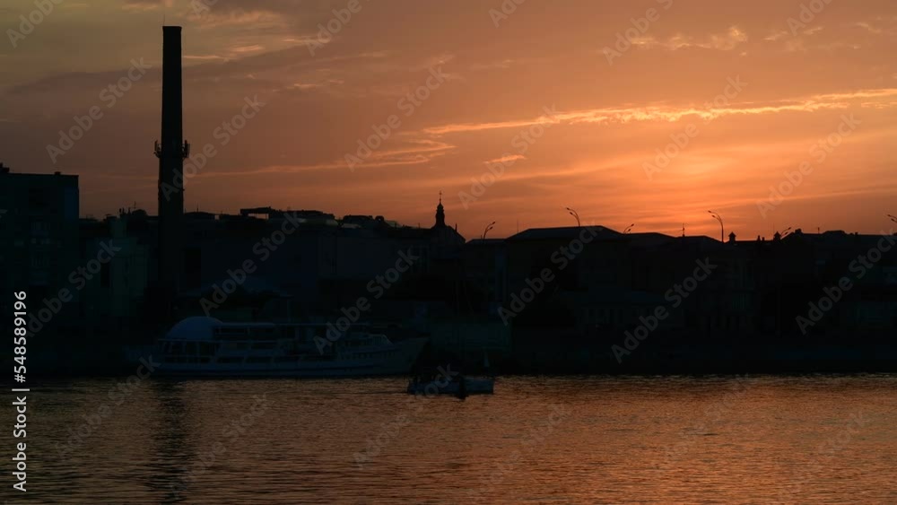Nice evening Kiev city view from left coast of Dnipro river at summer sunset time Nice evening Kiev city view from left coast of Dnipro river at summer sunset time