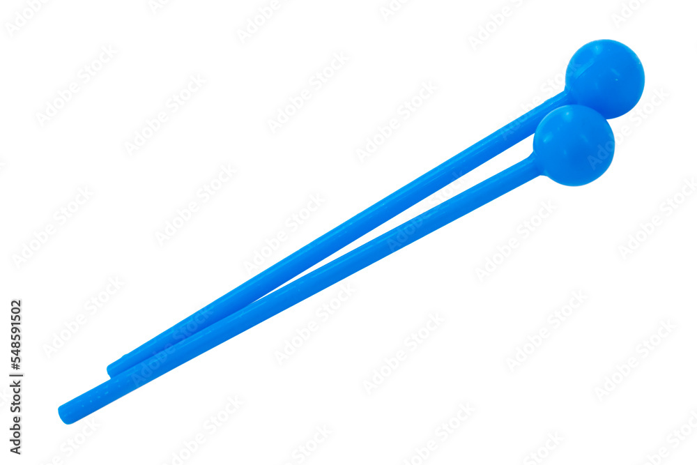 Toy colorful drumsticks isolated on the white background Toy colorful drumsticks isolated on the white background