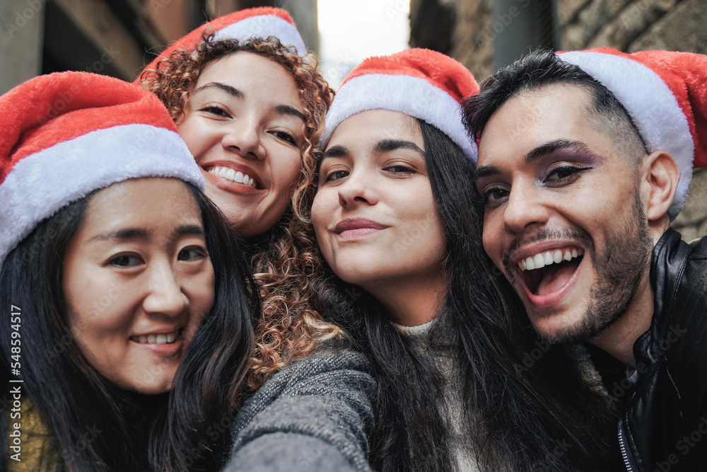 group of people in christmas hats