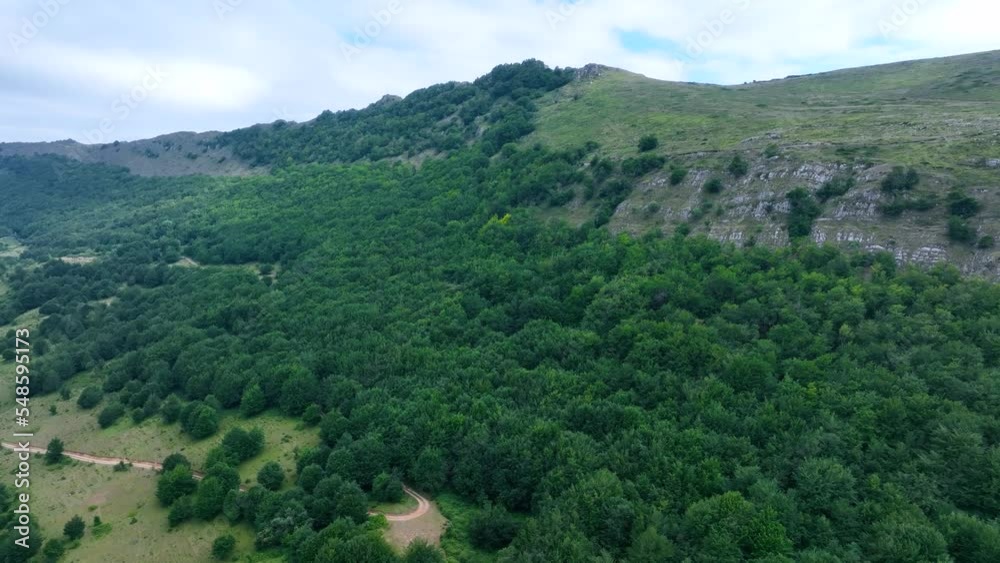 Spring landscape in the surroundings of Barcina de los Montes. Aerial view from a drone. La Bureba region. Burgos, Castilla y Leon, Spain, Europe Spring landscape in the surroundings of Barcina de los Montes. Aerial view from a drone. La Bureba region. Burgos, Castilla y Leon, Spain, Europe
