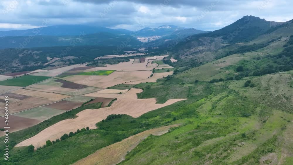 Spring landscape in the surroundings of Barcina de los Montes. Aerial view from a drone. La Bureba region. Burgos, Castilla y Leon, Spain, Europe Spring landscape in the surroundings of Barcina de los Montes. Aerial view from a drone. La Bureba region. Burgos, Castilla y Leon, Spain, Europe