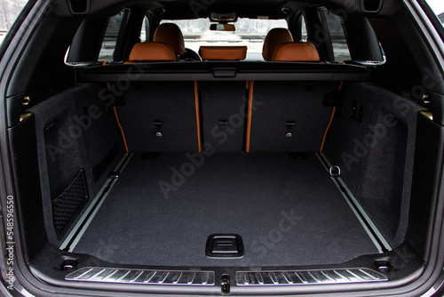 Fotografie, Obraz Huge, clean and empty car trunk in interior of compact suv